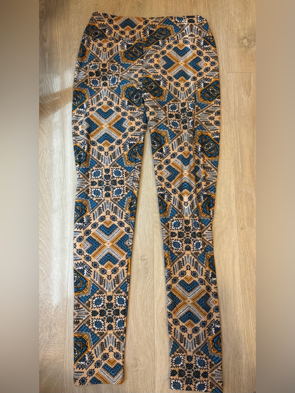 LuLaRoe Blue, Yellow and Tan Aztec Print Leggings - ONE SIZE